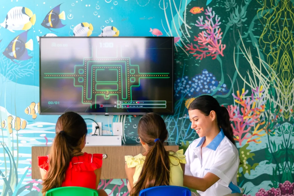 Garza Blanca Cancun Kids Club staff caring children
